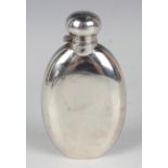 An Elizabeth II silver hip flask of flattened oval form with screw hinged lid, Sheffield 1988,