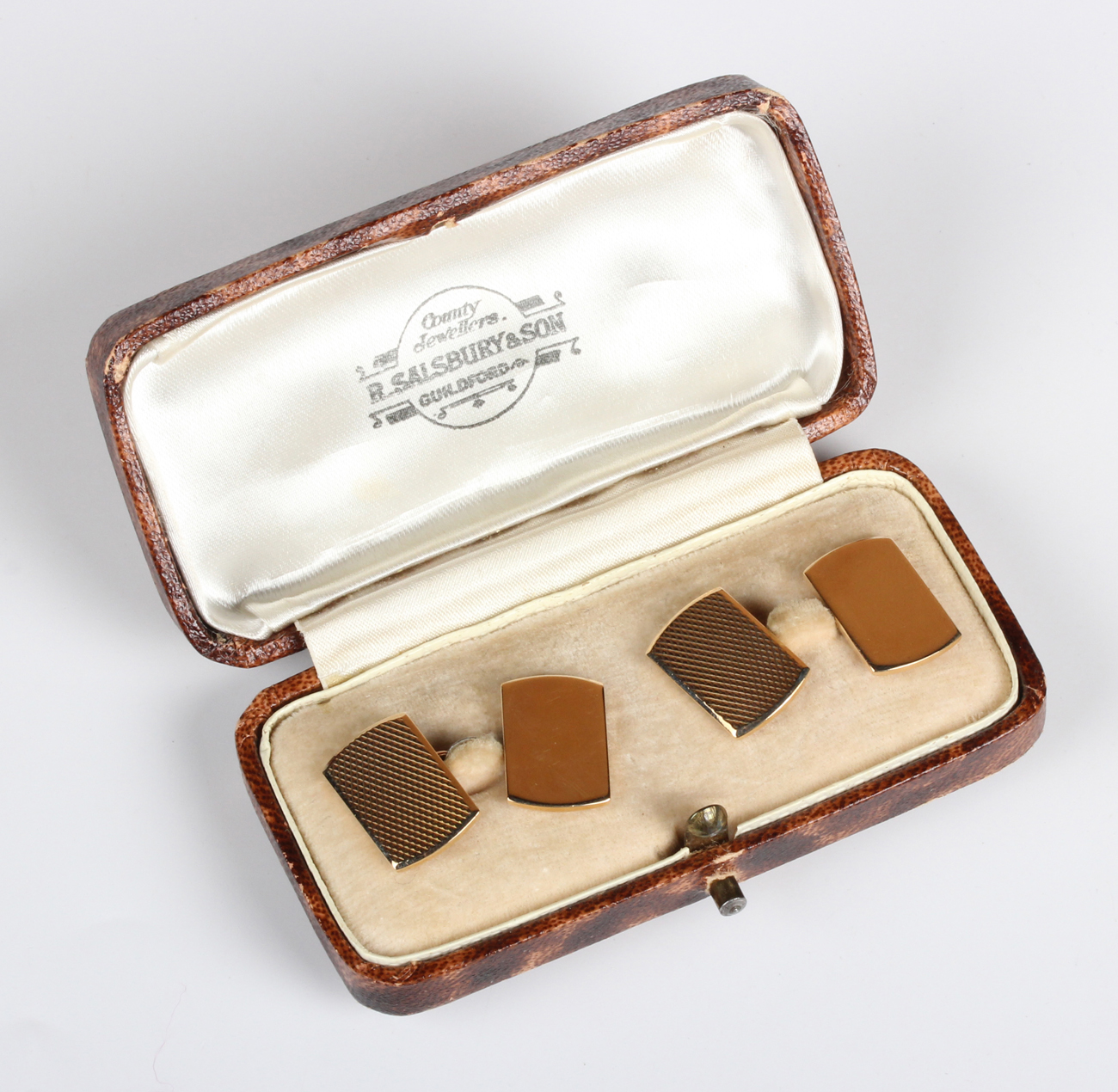 A pair of 9ct gold curved rectangular cufflinks, the fronts with engine turned decoration, London - Image 2 of 3