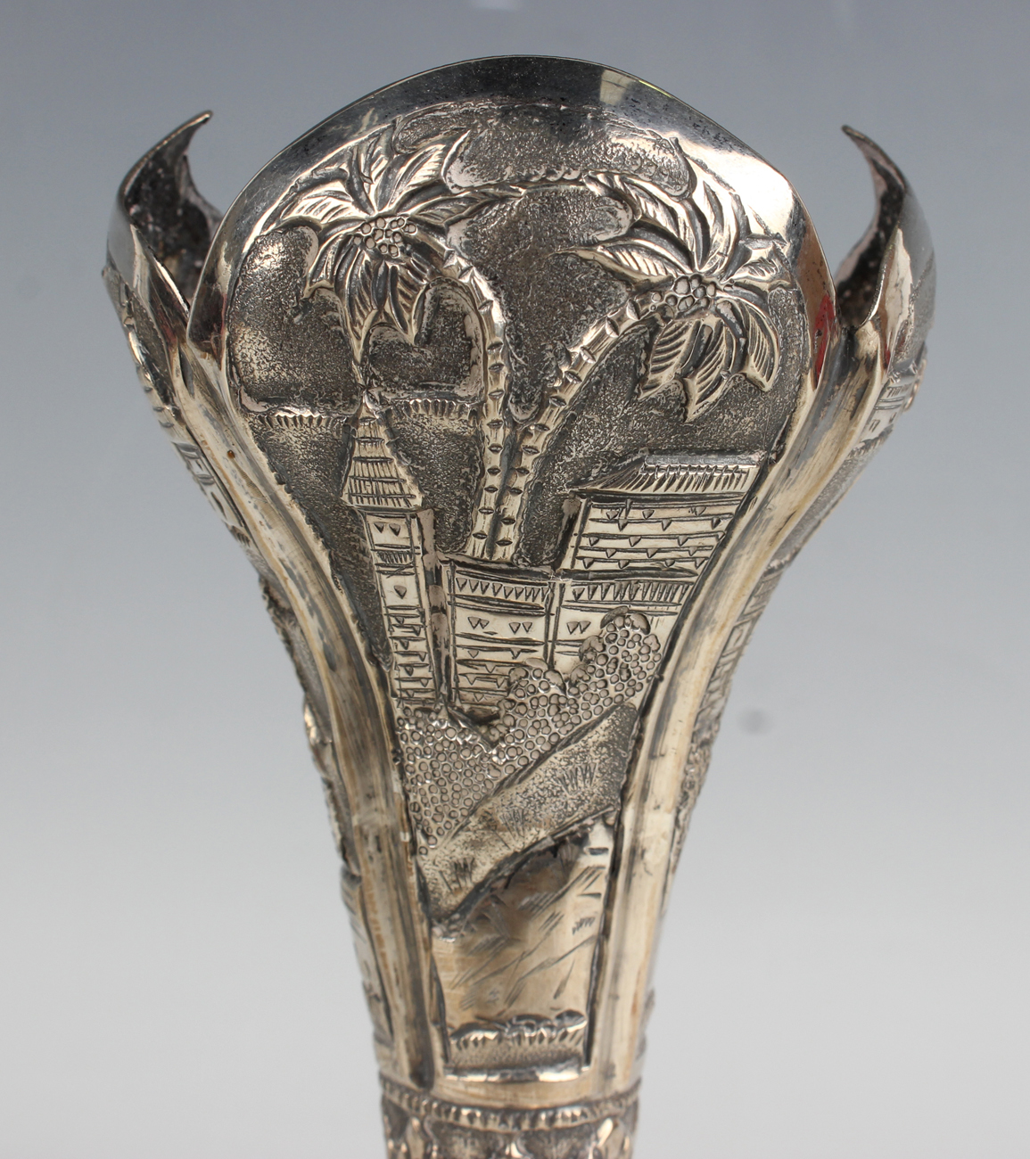 An Indian white metal posy vase, embossed with buildings in landscapes, on a circular foot, height - Image 9 of 10
