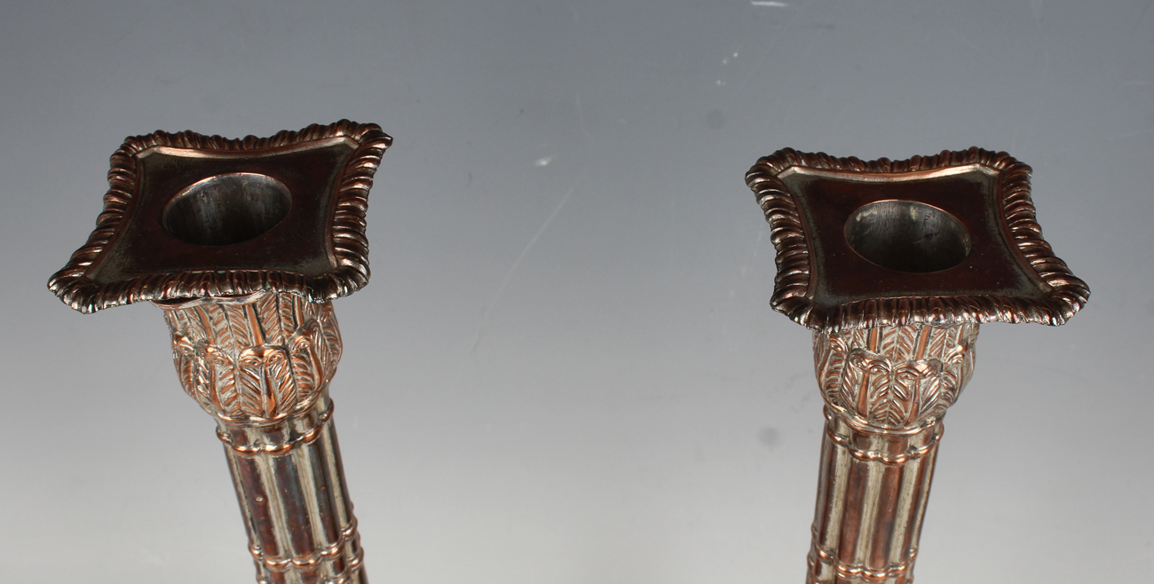 A pair of George III Sheffield plate cluster column candlesticks, each with a detachable nozzle on a - Image 2 of 5