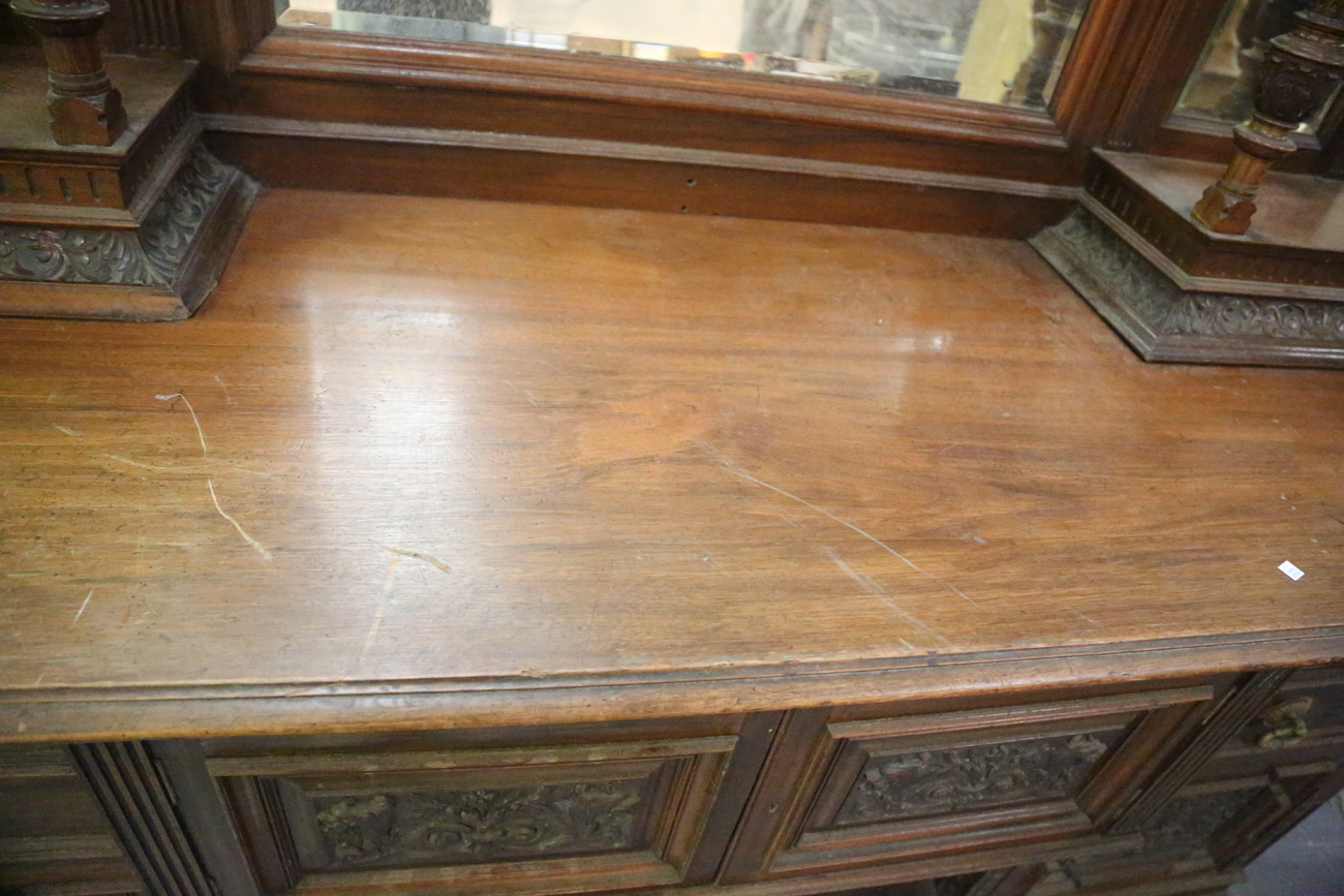 A large late Victorian walnut breakfront sideboard by James Shoolbred & Co, the mirror back with a - Image 9 of 16