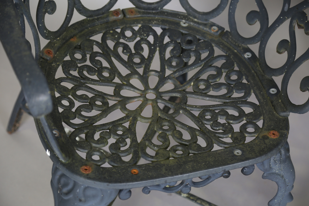 A 20th century cast metal circular garden table, height 66cm, diameter 87cm, and four matching - Image 5 of 13