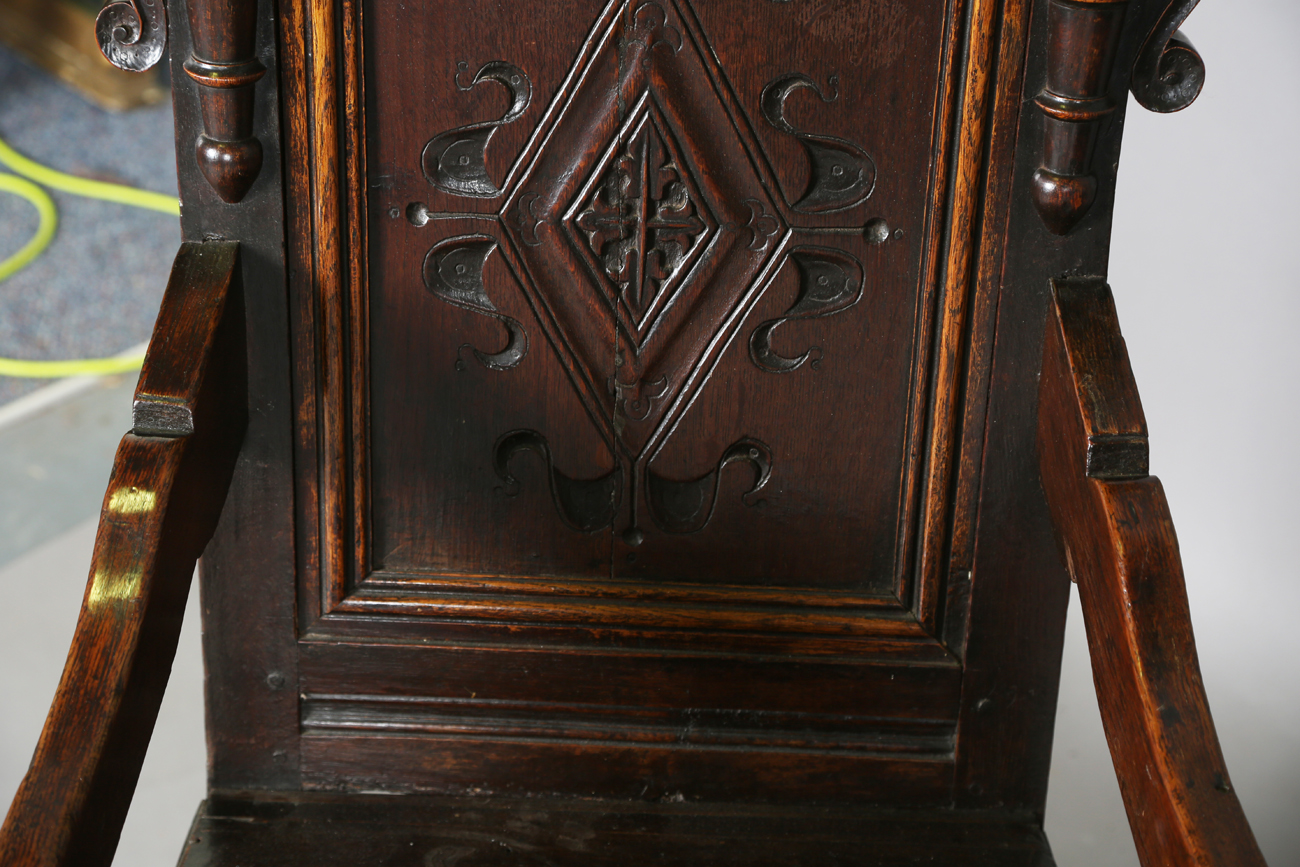 A pair of 17th century provincial oak Wainscot armchairs with carved panel backs and solid panel - Image 15 of 16