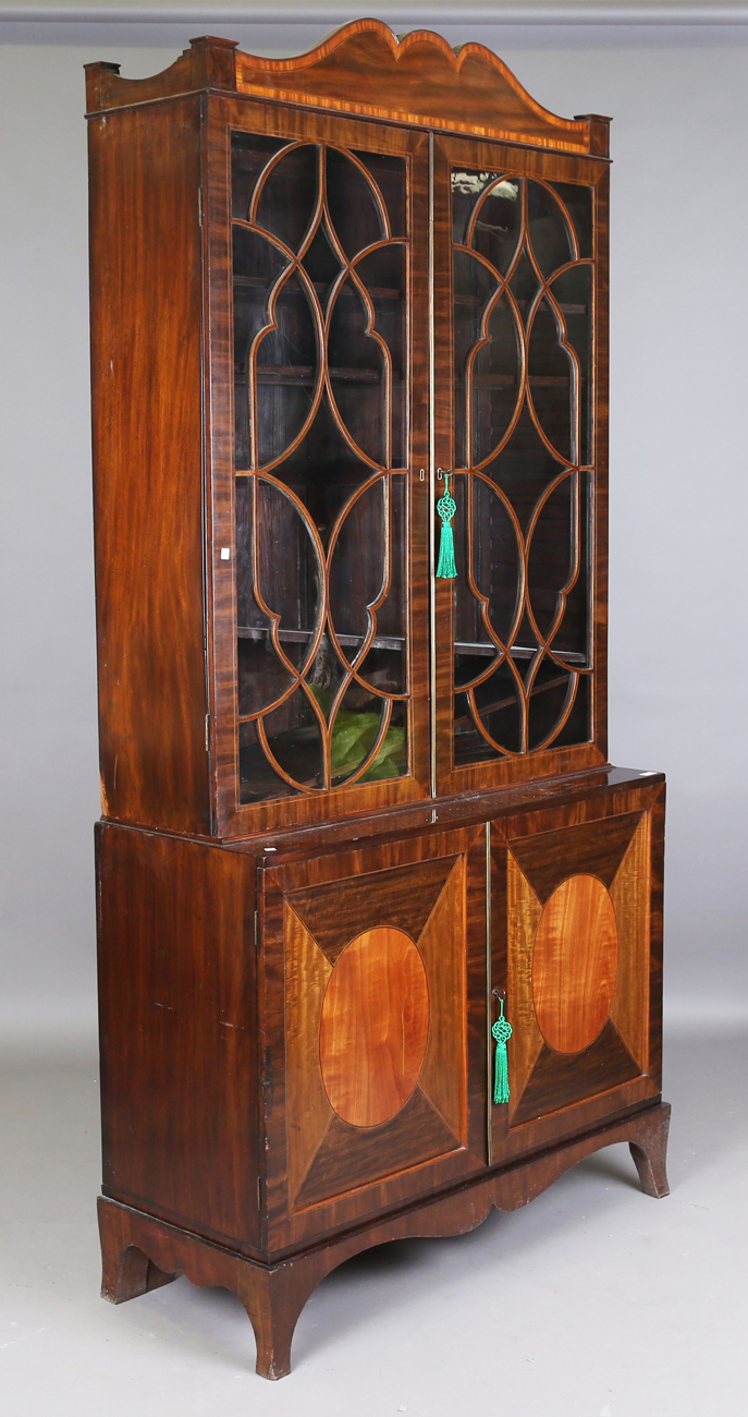 A George III Sheraton period mahogany library bookcase cabinet with satinwood crossbanded