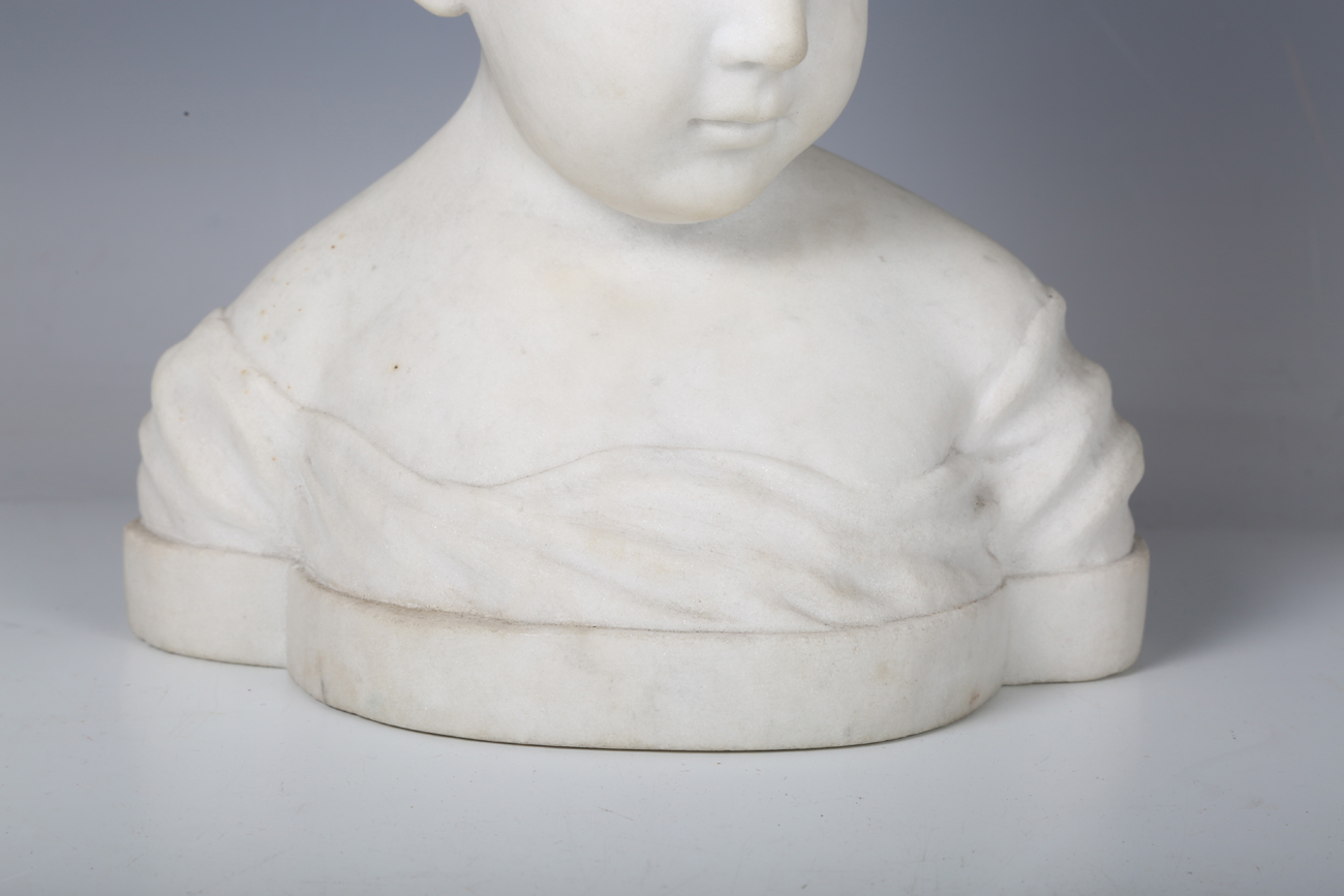 An early 20th century carved marble bust of a young boy, unsigned, height 24cm.Buyer’s Premium 29.4% - Image 7 of 9