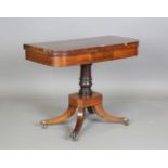 A Regency rosewood and satinwood crossbanded fold-over card table, height 73cm, width 91cm, depth