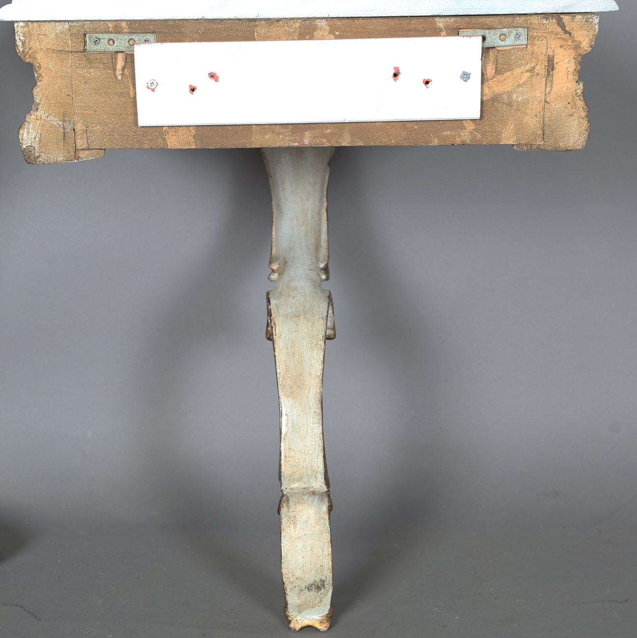 A pair of modern Rococo style white and gilt painted carved wooden console tables with shaped - Image 3 of 15