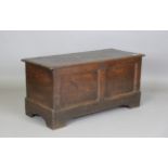 An 18th century oak panelled coffer, height 57cm, width 114cm, depth 49cm.Buyer’s Premium 29.4% (