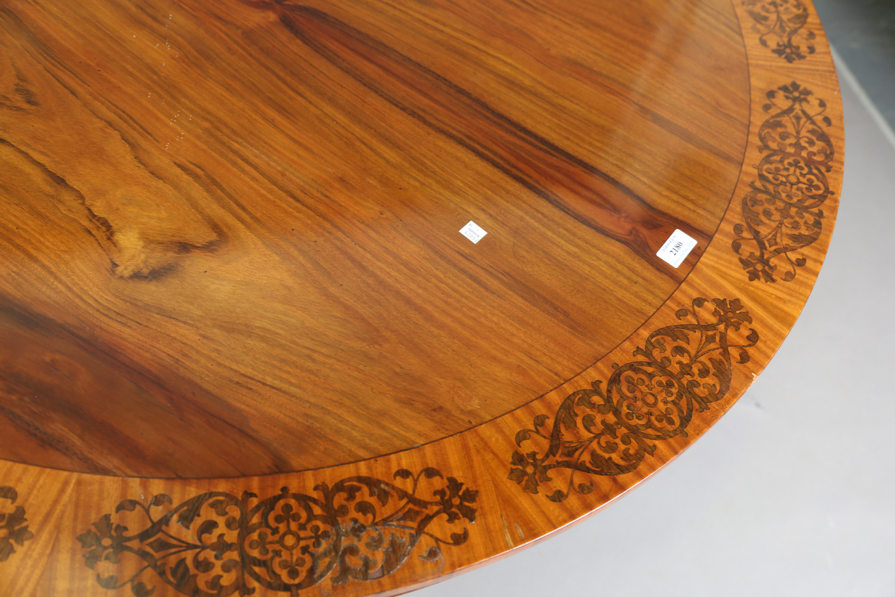 A mid-19th century walnut and foliate inlaid tip-top breakfast table, raised on a triform base, - Image 9 of 13