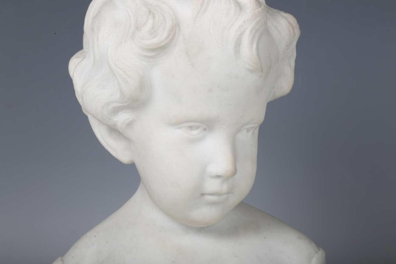 An early 20th century carved marble bust of a young boy, unsigned, height 24cm.Buyer’s Premium 29.4% - Image 9 of 9