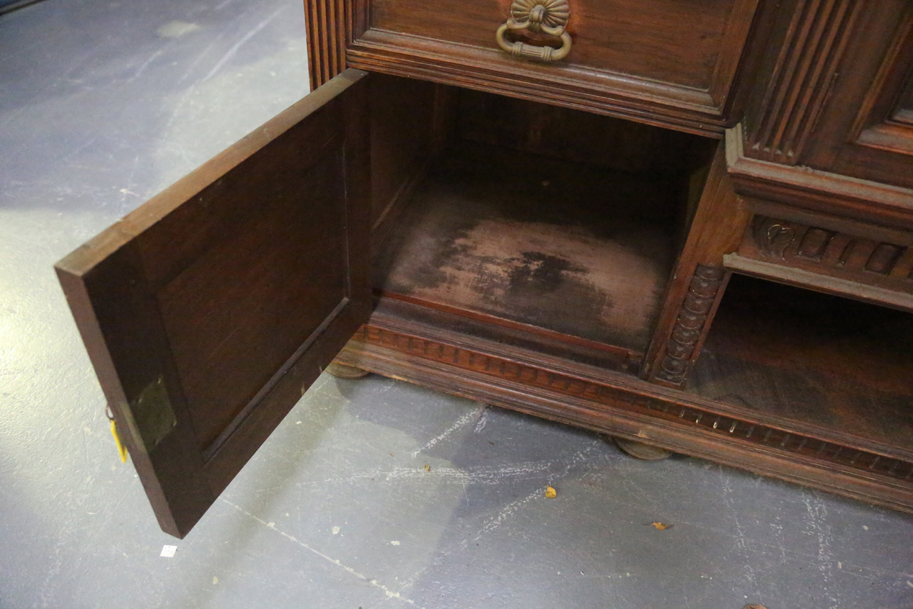 A large late Victorian walnut breakfront sideboard by James Shoolbred & Co, the mirror back with a - Image 4 of 16