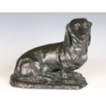 Carin Trygger - a 20th century Danish patinated bronze model of a seated dachshund, bearing cast