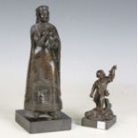 A 19th century Continental patinated bronze figure of a regal female holding a goblet and dish,