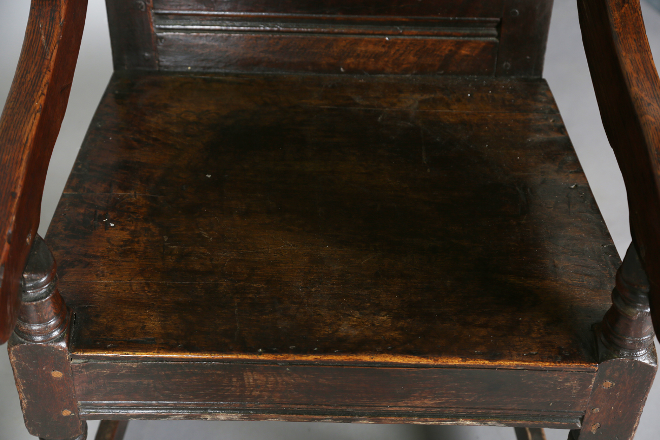 A pair of 17th century provincial oak Wainscot armchairs with carved panel backs and solid panel - Image 7 of 16