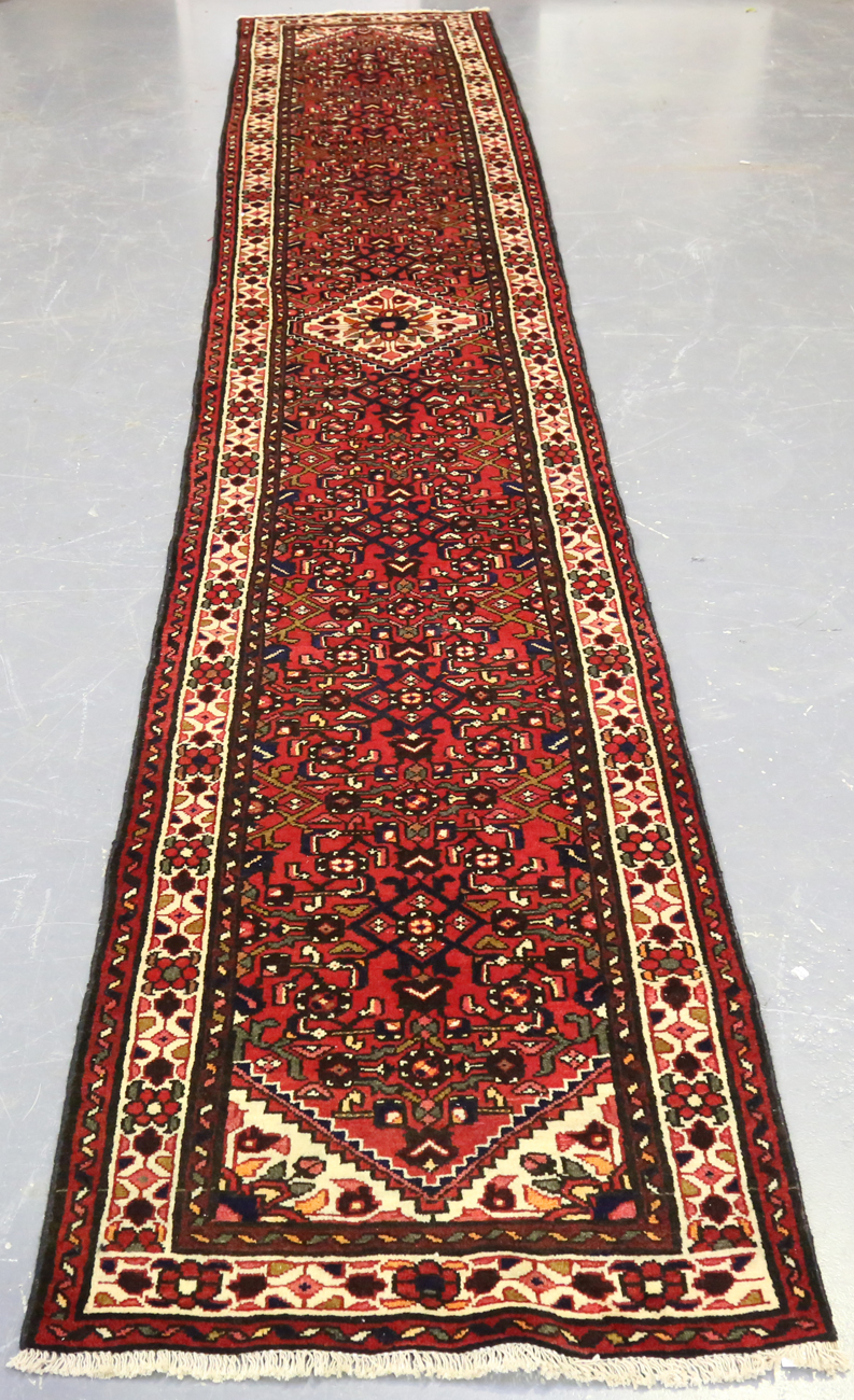 A Malayer runner, North-west Persia, mid/late 20th century, the red field with an overall floral - Image 9 of 9