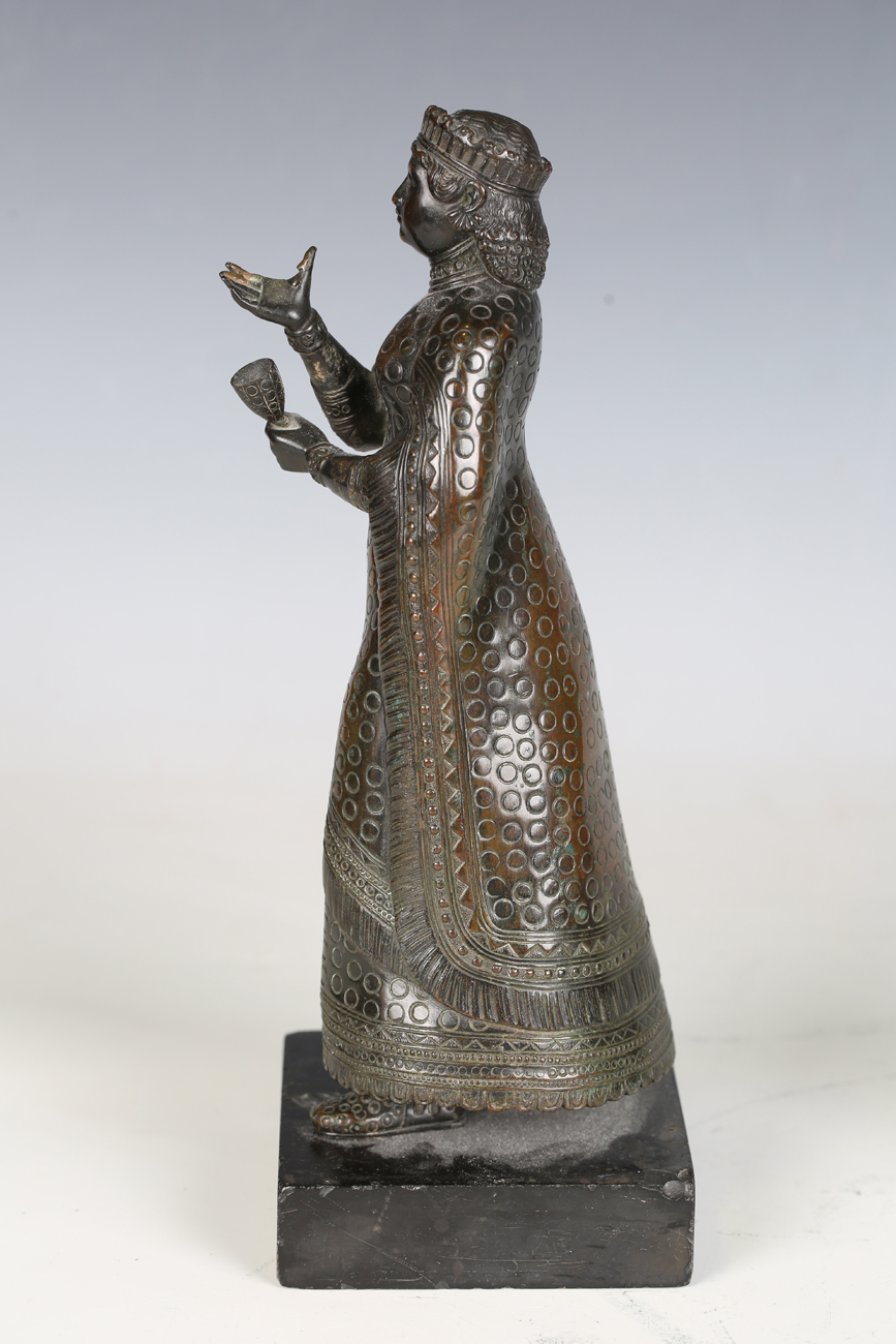 A 19th century Continental patinated bronze figure of a regal female holding a goblet and dish, - Image 10 of 17