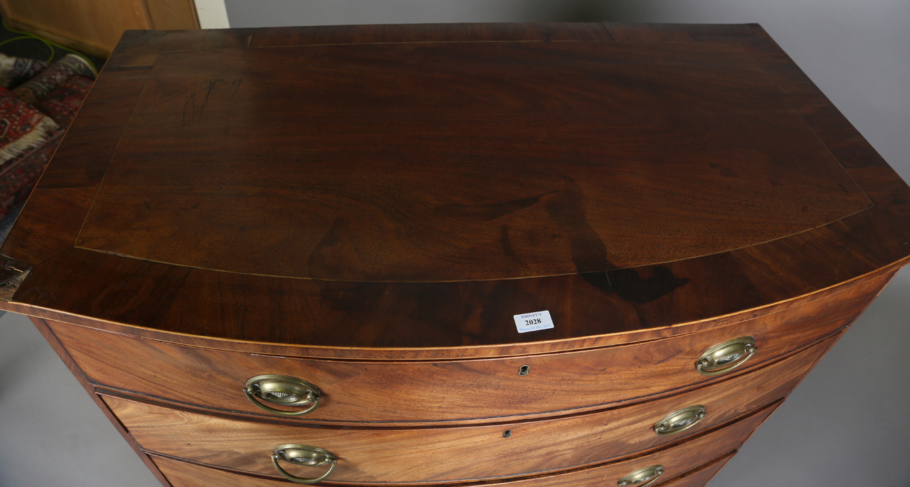 A George III mahogany bowfront chest of oak-lined drawers, the top with a wide crossbanded border, - Image 11 of 11