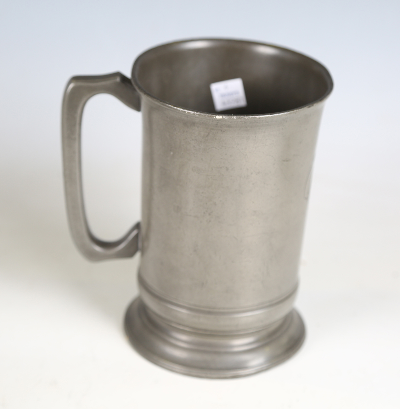 A collection of mainly 19th century pewter, including a spouted quart tankard, another quart tankard - Image 13 of 15