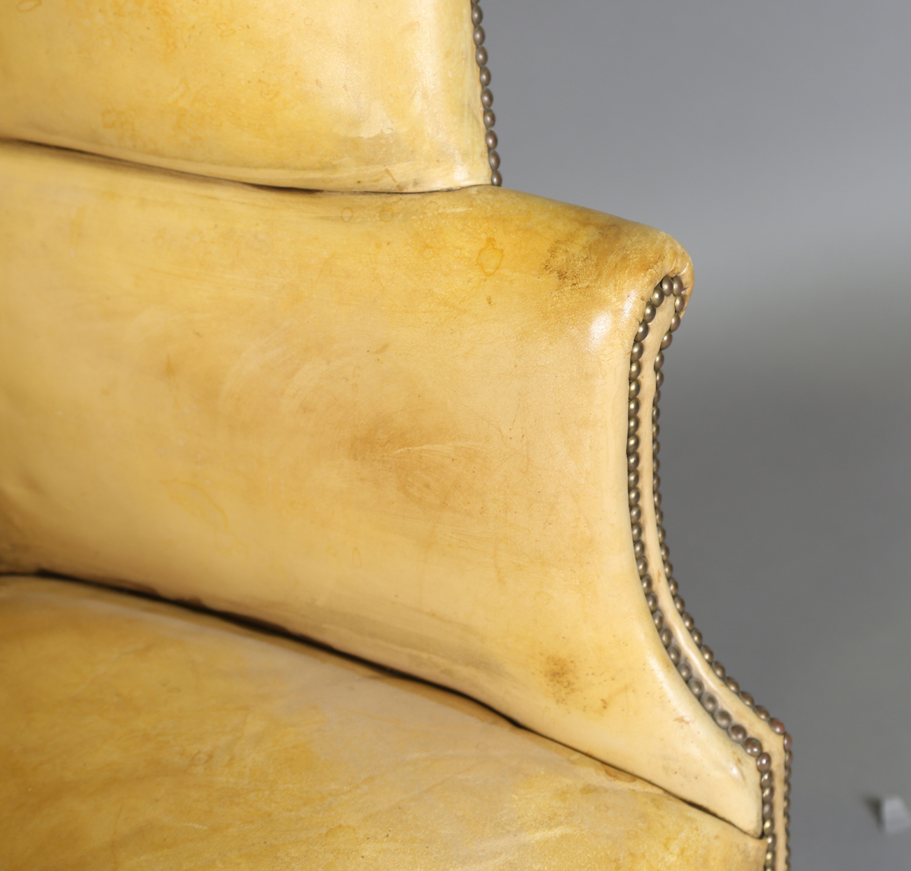 A 20th century George III style armchair, upholstered in studded tan leather, raised on carved - Image 11 of 14