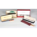 A Parker Duofold fountain pen, a Sheaffer fountain pen, circa 1971, cased, and a small collection of