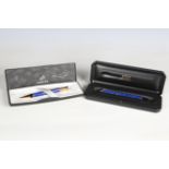 A Parker Duofold fountain pen with marbled blue body and a matching Parker Duofold propelling