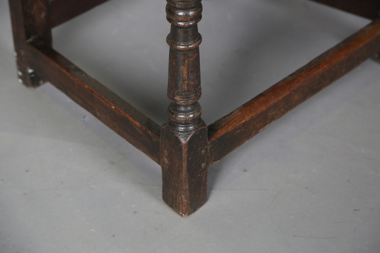 A pair of 17th century provincial oak Wainscot armchairs with carved panel backs and solid panel - Image 12 of 16