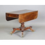 A Regency mahogany Pembroke table, on a turned column and four sabre legs, height 73cm, width 105cm,