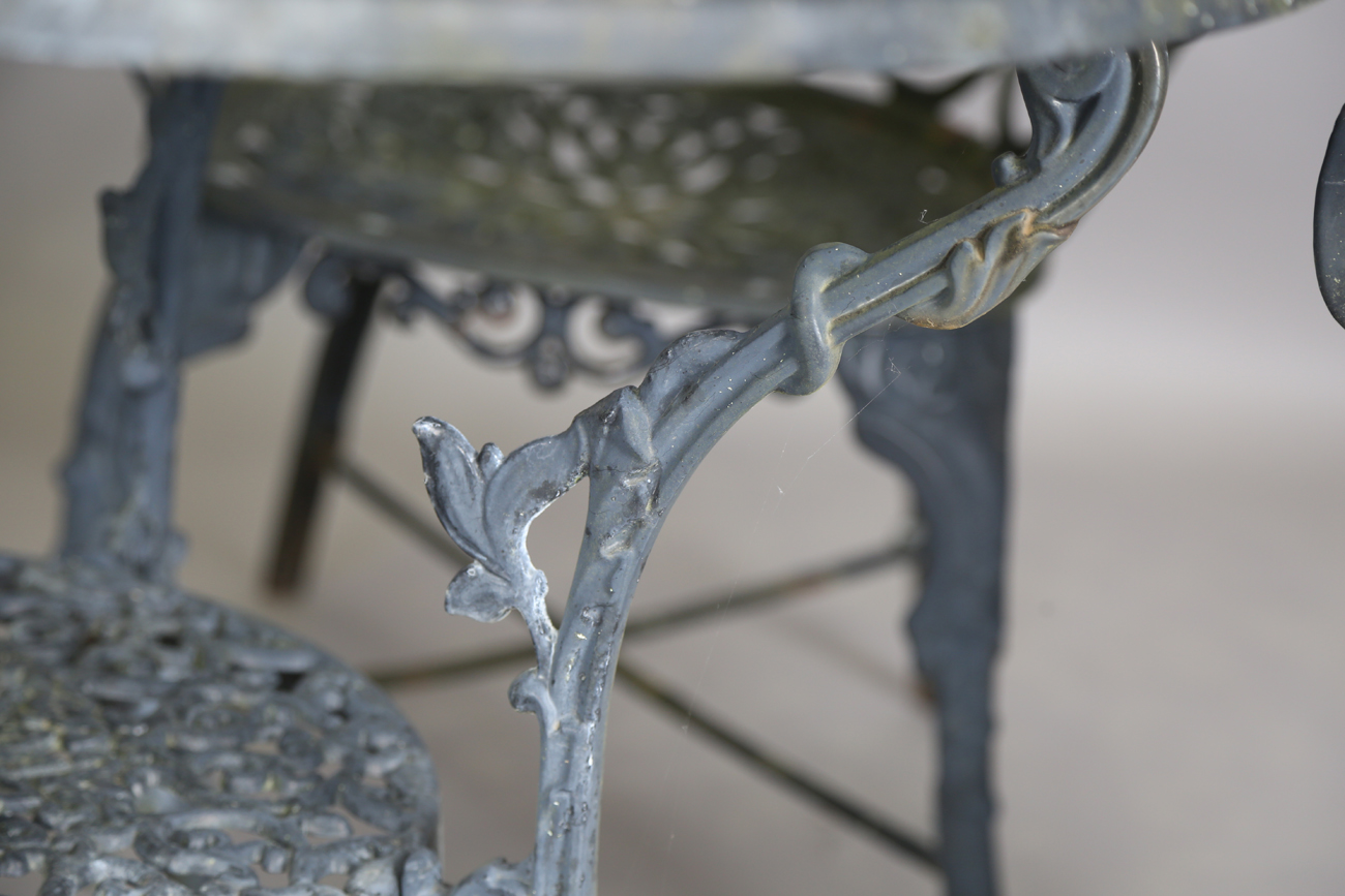 A 20th century cast metal circular garden table, height 66cm, diameter 87cm, and four matching - Image 8 of 13