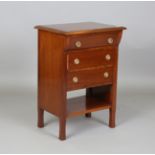 A 20th century Arts and Crafts style mahogany chest of three drawers, height 78cm, width 54cm, depth