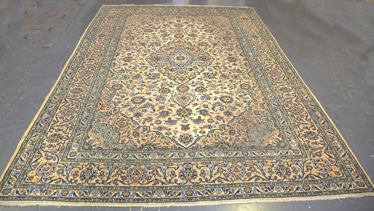 A Kashan carpet, Central Persia, mid/late 20th century, the ivory field with a shaped medallion,