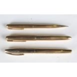 A Parker gold plated fountain pen, the body engraved 'Norman', length 14cm, a Sheaffer gold plated