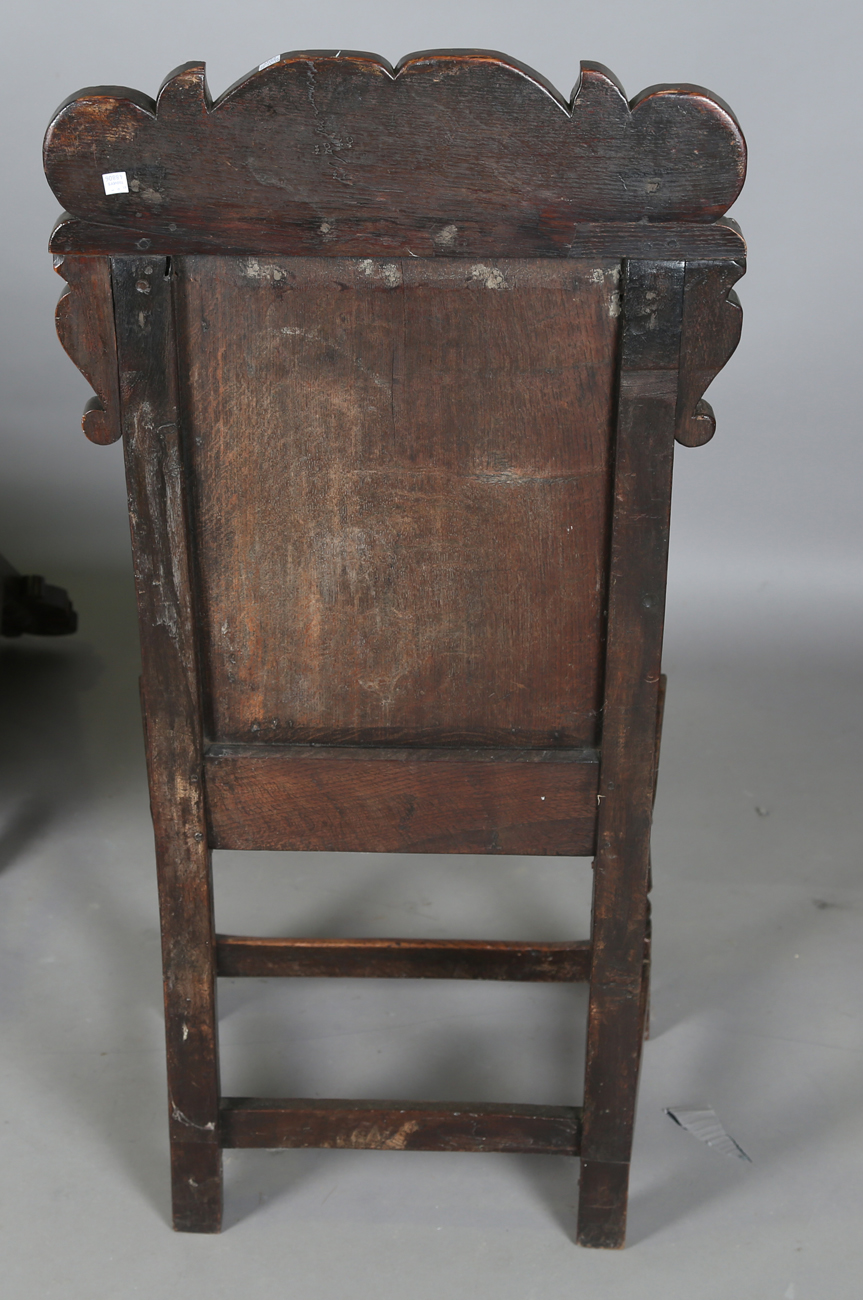 A pair of 17th century provincial oak Wainscot armchairs with carved panel backs and solid panel - Image 5 of 16