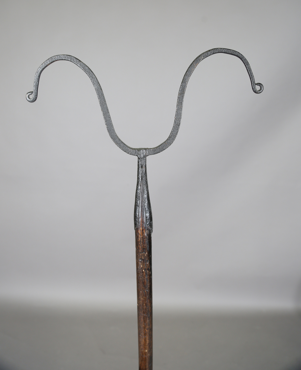 A scarce 19th century wrought iron shepherd's dipping crook, the shaped head on an ash shaft, length - Image 6 of 9