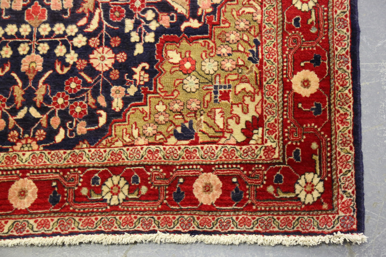 A Sarough rug, Central Persia, late 20th century, the dark blue field with a shaped medallion, - Image 3 of 5