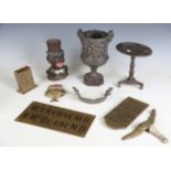A mixed group of collectors' items, including a bronze model of a table, height 20cm, a 'Deluce's