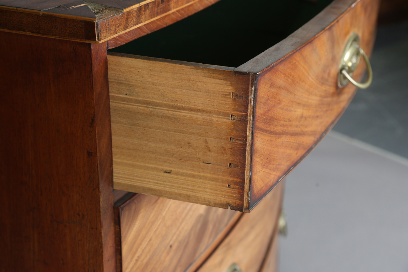 A George III mahogany bowfront chest of oak-lined drawers, the top with a wide crossbanded border, - Image 7 of 11