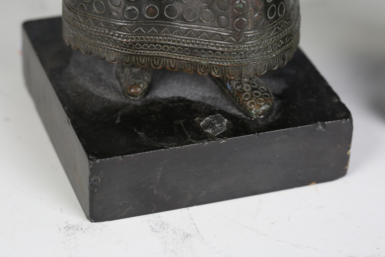 A 19th century Continental patinated bronze figure of a regal female holding a goblet and dish, - Image 13 of 17