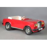 A Harrods special edition child's battery-operated ride-on Rolls-Royce Corniche, length 122cm (