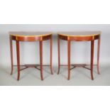 A pair of modern reproduction mahogany demi-lune side tables with bellflower and fan patera inlay,