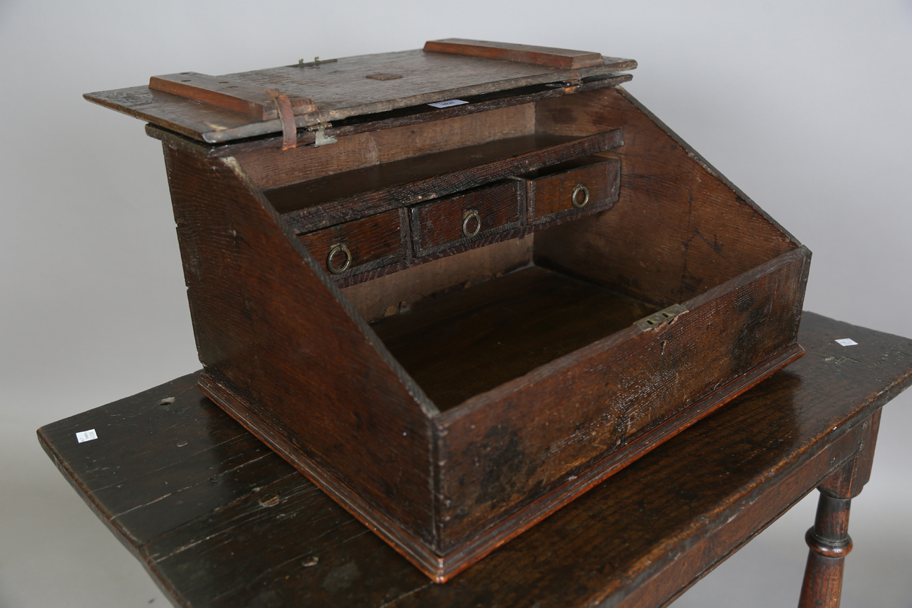 A 17th century oak bible box, the hinged sloping lid enclosing three drawers, width 53cm, depth - Image 12 of 13