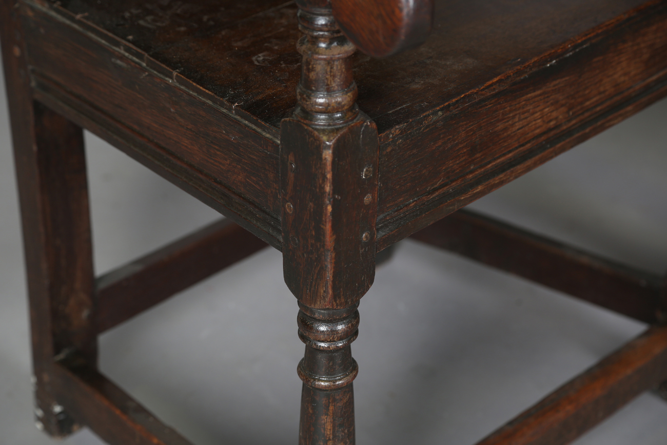 A pair of 17th century provincial oak Wainscot armchairs with carved panel backs and solid panel - Image 13 of 16