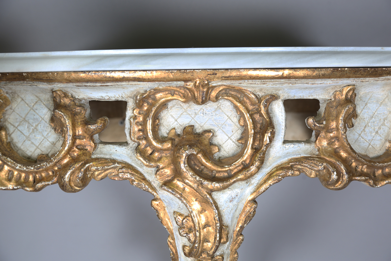 A pair of modern Rococo style white and gilt painted carved wooden console tables with shaped - Image 10 of 15