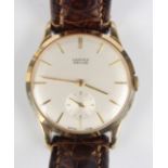 A Vertex Revue 9ct gold circular cased gentleman's wristwatch with signed jewelled movement, the