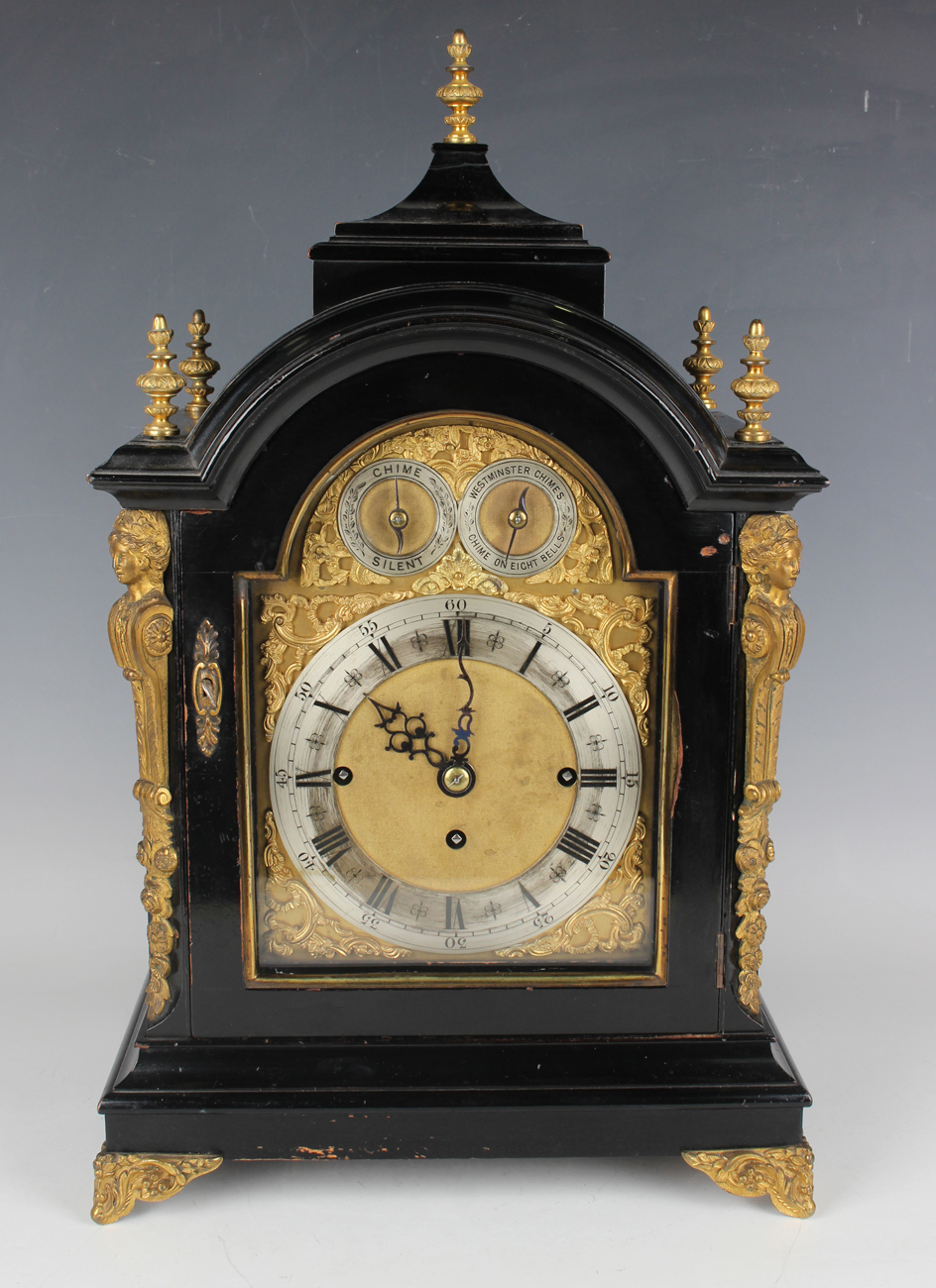 A late Victorian ebonized and gilt brass mounted bracket clock with eight day triple fusee