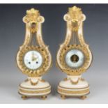 A late 19th century French ormolu mounted white marble Marie Antoinette style mantel clock and