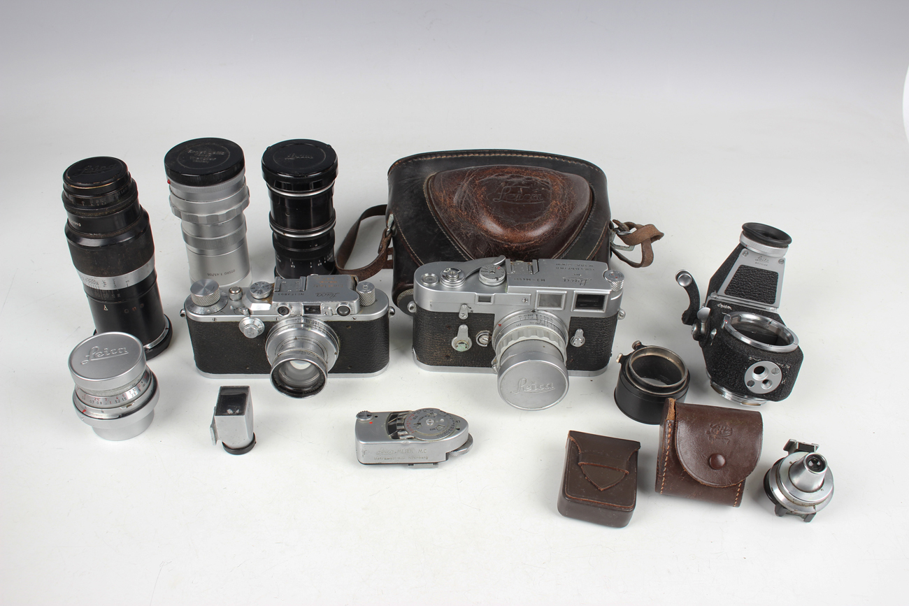 A collection of Leica cameras and accessories, including an M3 camera, No. 964591, circa 1959,