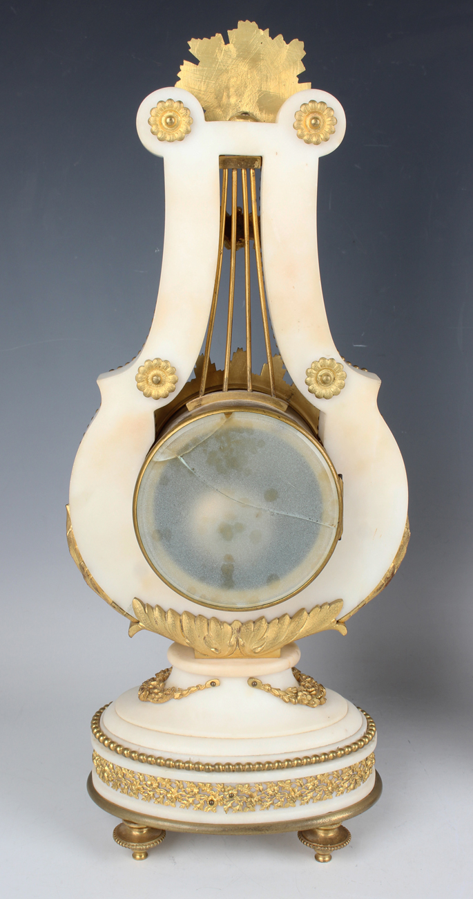 A late 19th century French ormolu mounted white marble Marie Antoinette style mantel clock and - Image 9 of 12