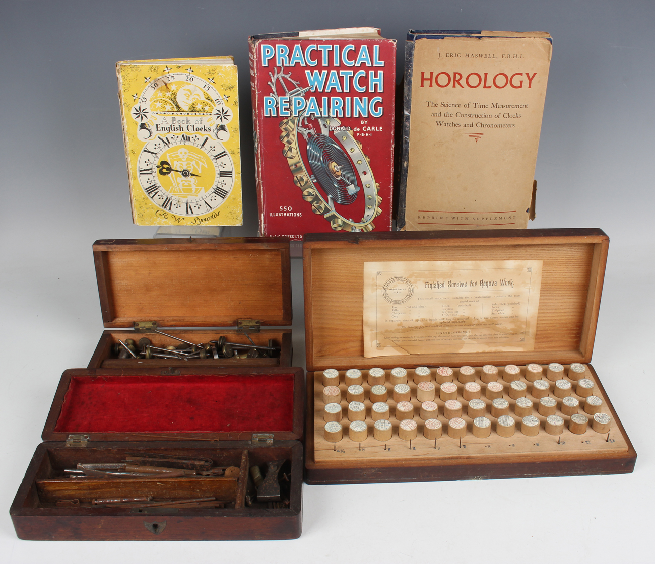 A collection of watchmaker's tools and accessories, including a depthing tool, a staking set, boxed,