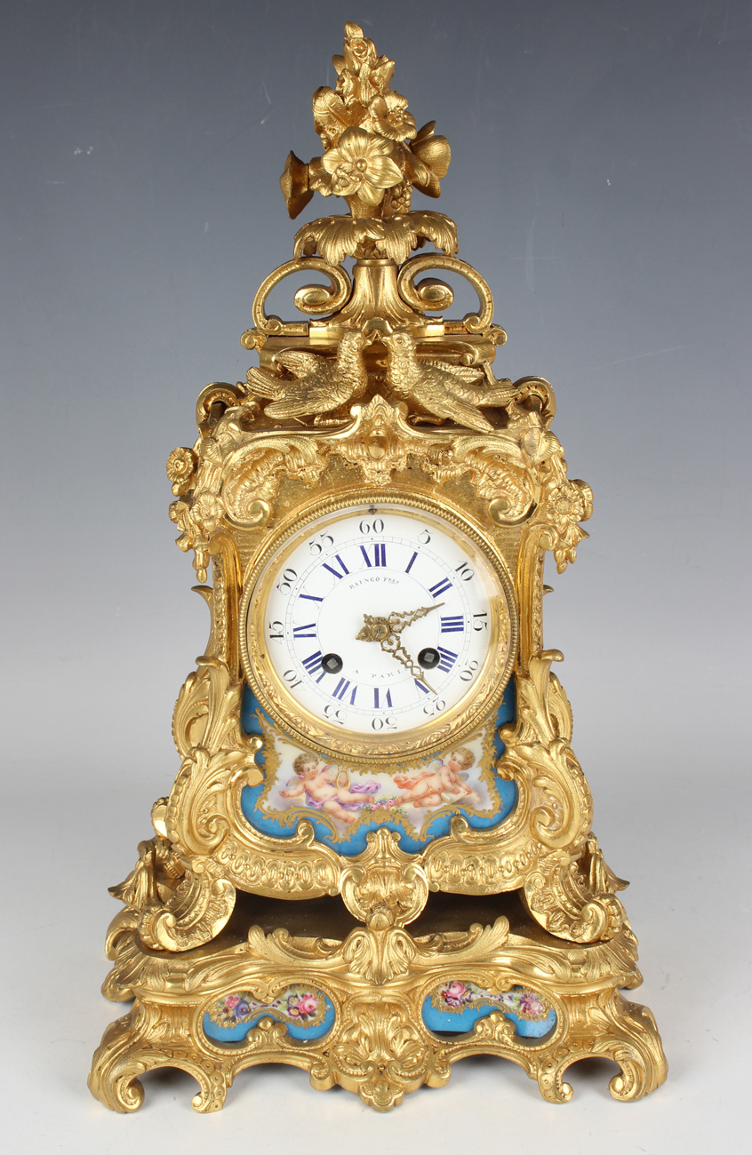 A late 19th century French ormolu and Sèvres style porcelain mantel clock with eight day movement