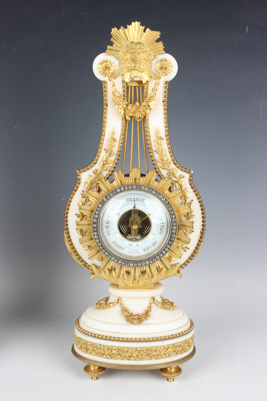 A late 19th century French ormolu mounted white marble Marie Antoinette style mantel clock and - Image 7 of 12